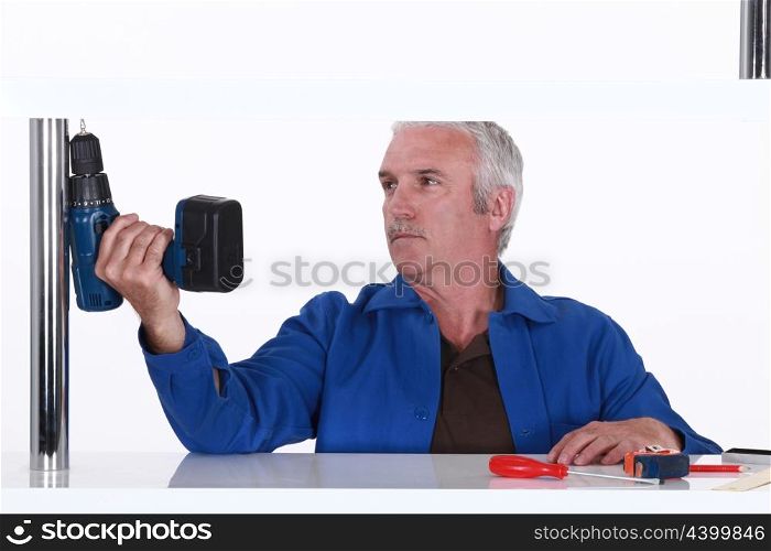 Man holding a power tool
