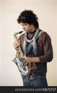 Man holding a saxophone