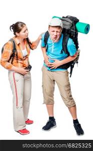 Man holding a sick stomach with his hands, near a woman with a backpack