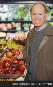 man holding an apple