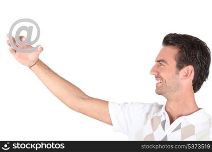 Man holding at symbol