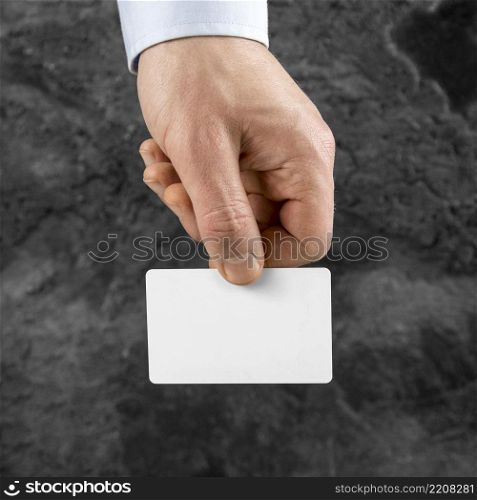 man holding blank card