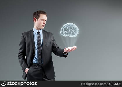 Man holding brain Hologram. Creativity idea concept.