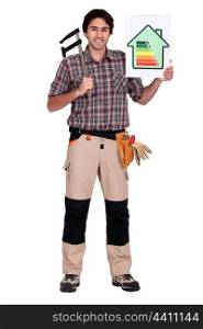 Man holding caliper and energy rating poster