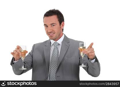 Man holding champagne glasses