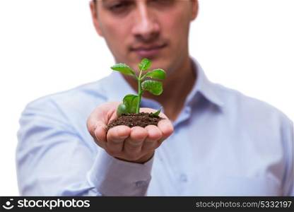 Man holding green seedling isolated on white