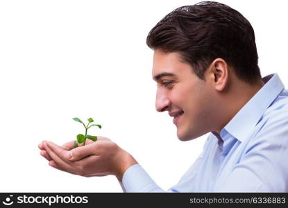 Man holding green seedling isolated on white