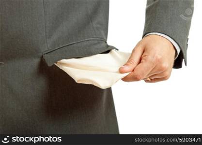 man holding his empty pocket, isolated on white