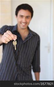 Man holding house keys