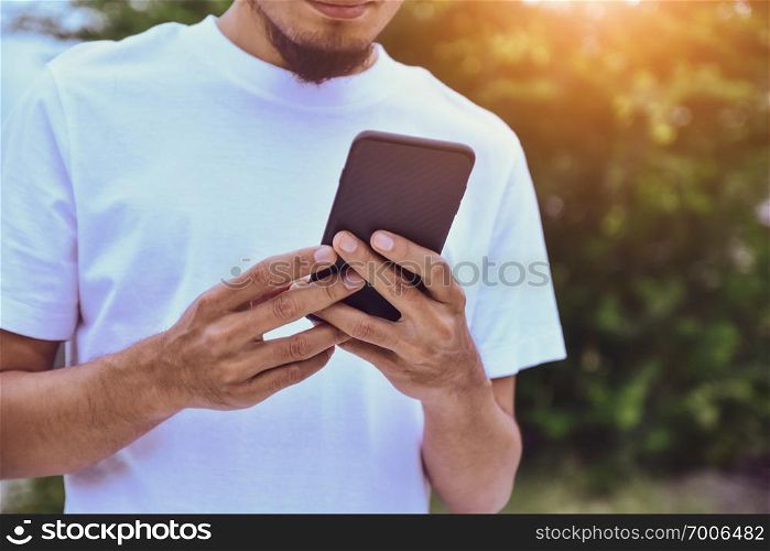 Man holding mobile smart phone