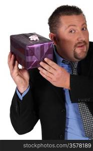 Man holding mysterious gift