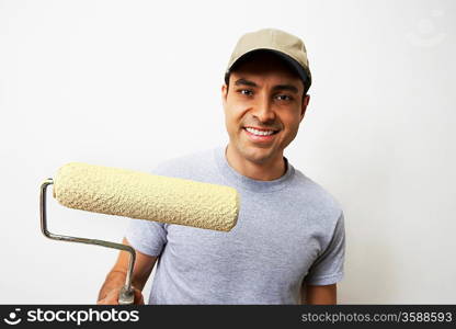 Man Holding Paint Roller