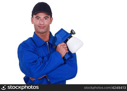 Man holding paint sprayer