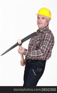 Man holding pick-axe