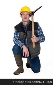 Man holding pickaxe