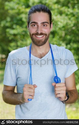 man holding plastic skipping rope