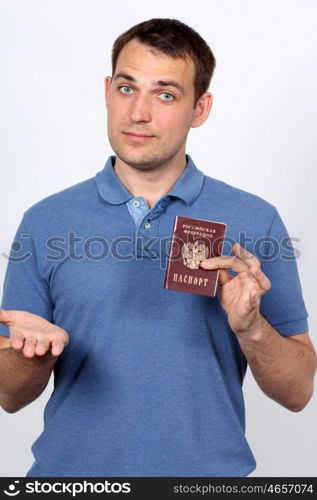 man holding russian passport