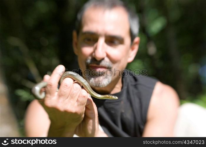 Man Holding Snake