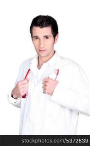 Man holding stethoscope