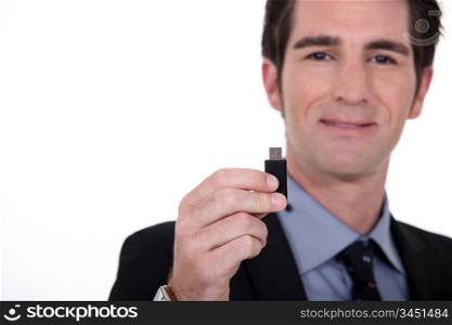 Man holding USB memory stick