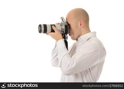 man holds a camera in his hands. Isolated on white background