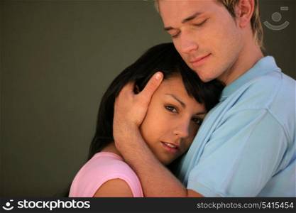 Man hugging his girlfriend