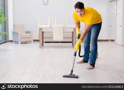 Man husband cleaning the house helping his wife