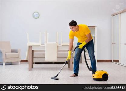 Man husband cleaning the house helping his wife