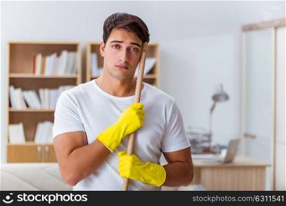 Man husband cleaning the house helping wife