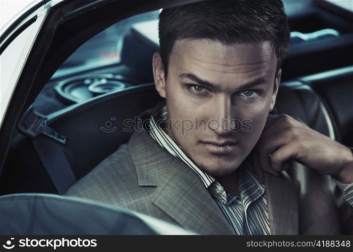 Man in a car.