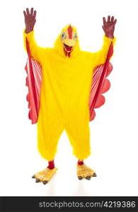 Man in a chicken suit with his hands up like he&rsquo;s cheering. Full body isolated on white.