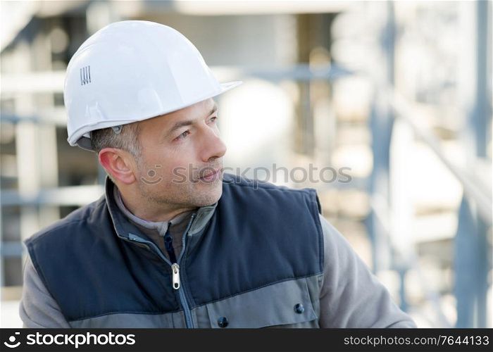 man in a helmet looking away