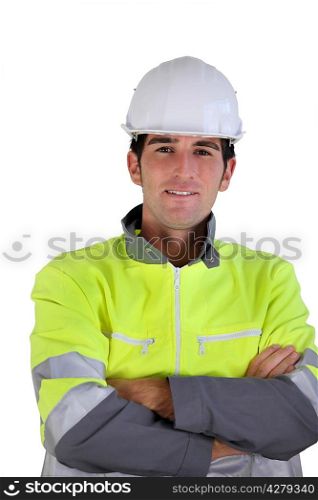 Man in a safety jacket and helmet