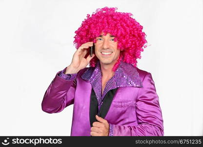 Man in a seventies disco costume and silly wig