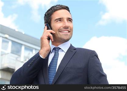 Man in a suit on the phone