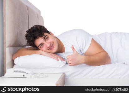 Man in bed suffering from insomnia