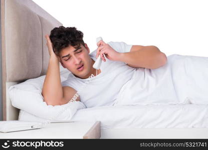 Man in bed suffering from insomnia