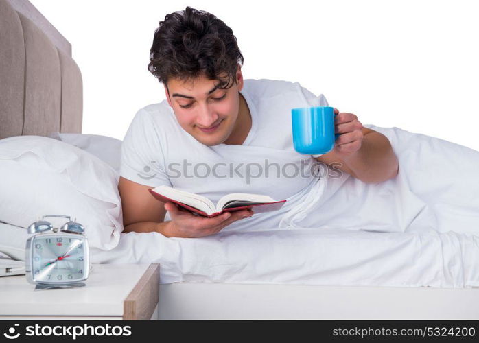 Man in bed suffering from insomnia