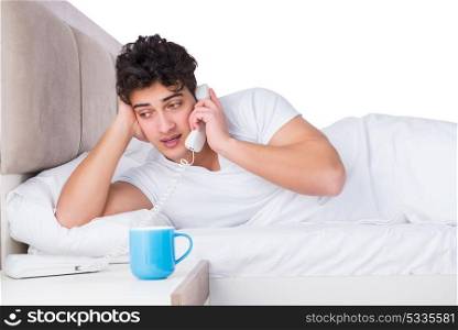 Man in bed suffering from insomnia