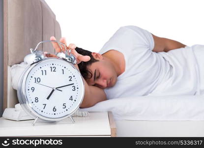 Man in bed suffering from insomnia