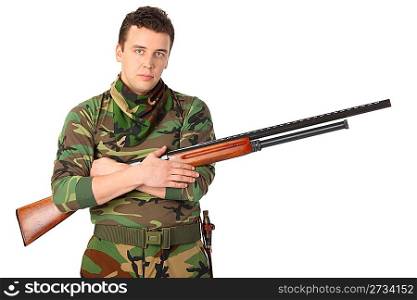 man in camouflage with gun