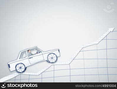 Man in car. Young man driving car made of sheet of paper