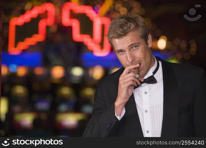 Man in casino with cigar (selective focus)