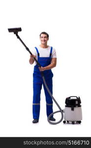 Man in coveralls doing vacuum cleaning on white