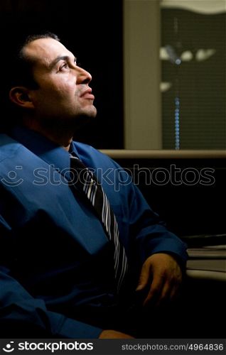 Man in dark office