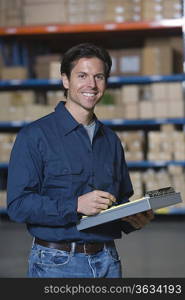 Man in distribution warehouse portrait