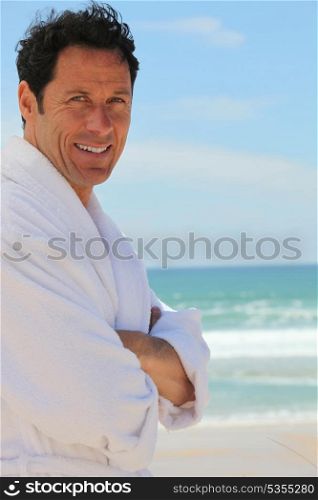 Man in dressing gown outdoors