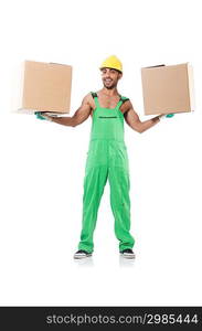 Man in green coveralls with boxes