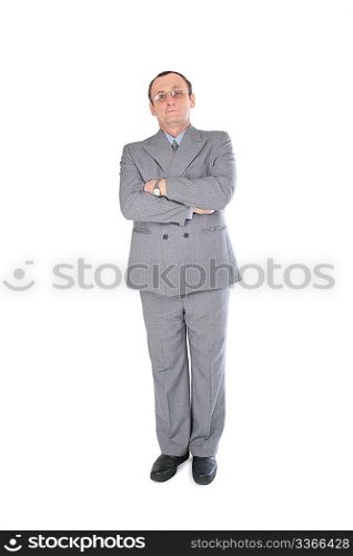 Man in grey suit stands