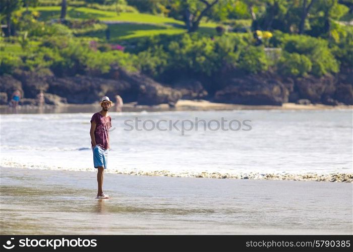 Man in Hat on a Tropical Beach.Jimbaran.Bali.Indonesia.